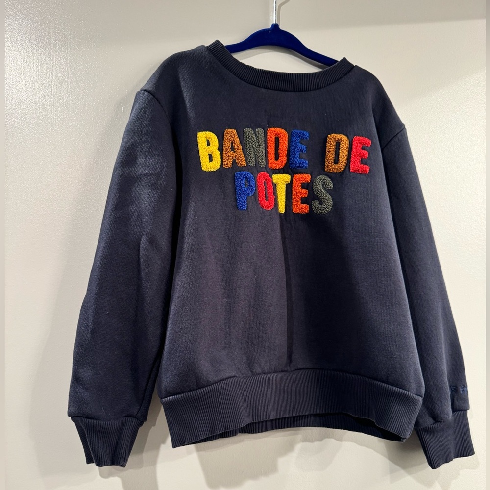 Navy sweatshirt in fair condition size 6